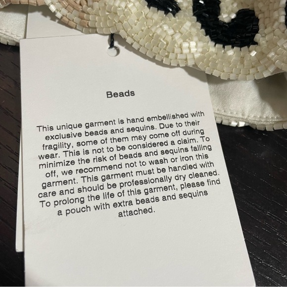 Hand Beaded Bag in Leopard
Ganni bag pouch crossbody sequins - Picture 7 of 10